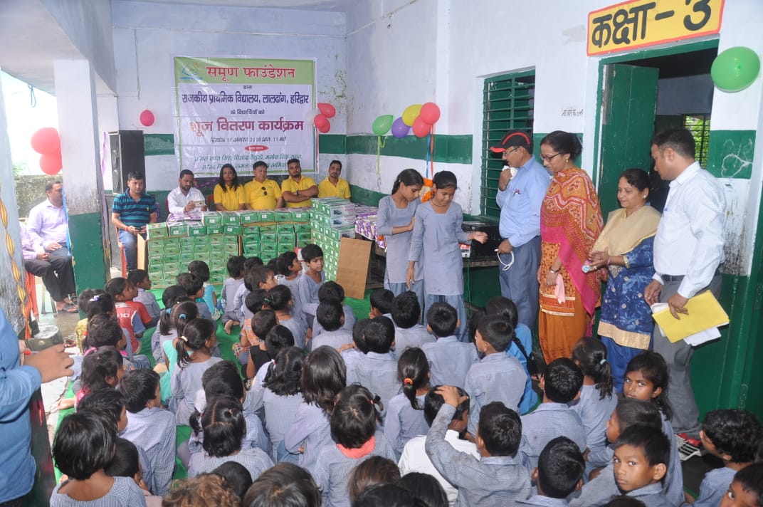 SHOES DISTRIBUTED TO THE STUDENTS OF PRIMARY SCHOOL OF LALDHANG